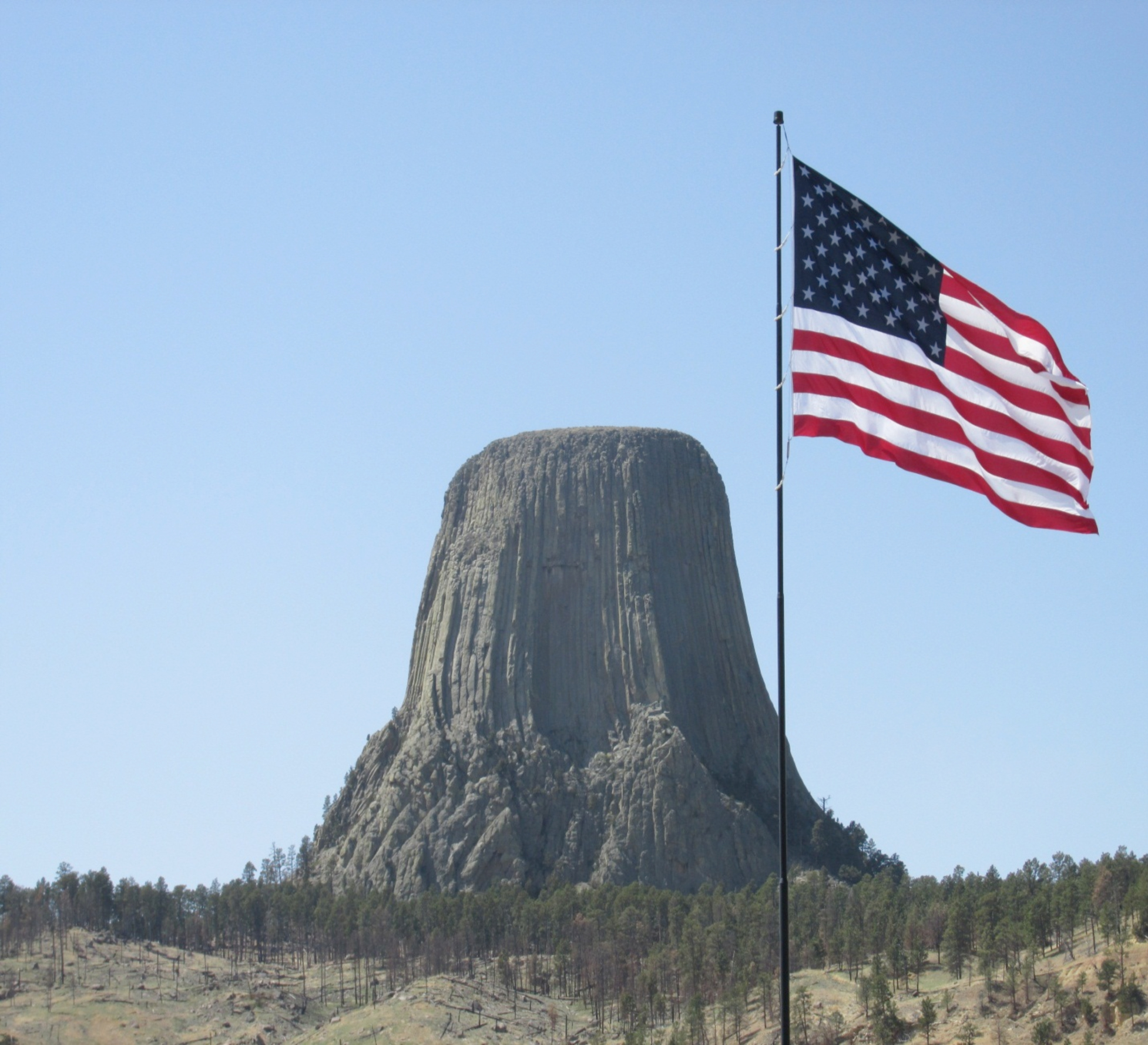 In the movie Close Encounters, the overwhelmingly powerful culture from far away made contact and then left; the alien culture resisted the temptation to plant their flag and claim the land as their own.  Leave it to science fiction to come up with an implausible ending…